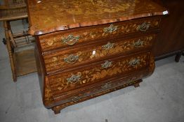 A beautiful and well proportioned 19th Century Continental bombe chest of four drawers, having