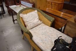 A wicker day bed, length approx. 170cm