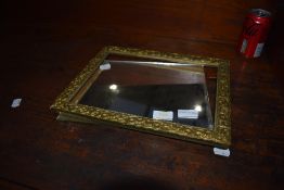 A vintage brass frame wall mirror, of small proportions, approx. 32 x 26cm (please note glass