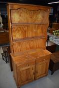 A vintage pine dresser of small proportions
