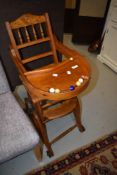 A Victorian light mahogany child's high/low chair