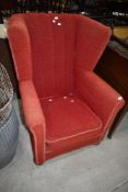 A vintage wing back dining chair red moquette upholstery
