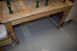 A 19th Century stripped pine kitchen table having frieze drawer, approx. 122 x 56cm