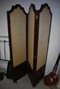 A late 19th or early 20th Century trifold screen/room divider having mahogany frame and fabric
