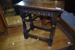 A traditional oak refectory style coffin stool type occasional table, approx. 46 x 25cm