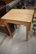 A stripped pine hall or kitchen work table, approx. 63 x 52cm, height 74cm
