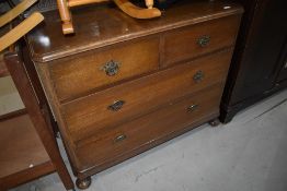 An early 20th Century oak dressing chest