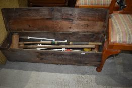 A vintage boxed croquet set