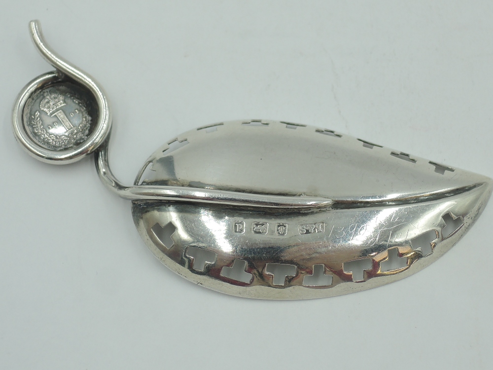 An Edwardian silver caddy spoon modelled as a leaf with pierced borders and stalk handle wound round - Image 4 of 4