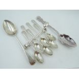A selection of HM silver spoons including a set of six coffee spoons with matching sugar nips, a