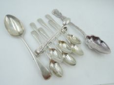 A selection of HM silver spoons including a set of six coffee spoons with matching sugar nips, a