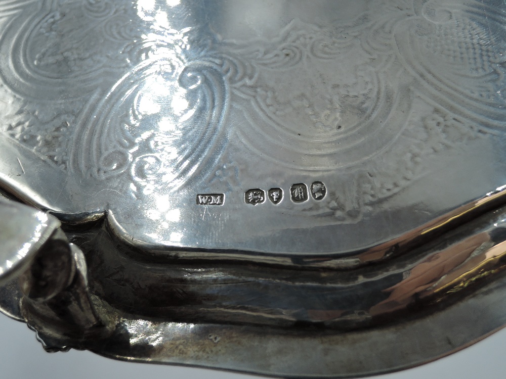 A Victorian silver salver having gadrooned pie crust rim, engraved decoration with central crest and - Image 2 of 3