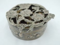 A silver pot pourri cannister having an open top in the form of entwined pansies, Birmingham 1912,