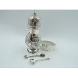 A Victorian silver sugar caster of baluster form having floral and panel decoration with plain