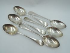 Six Edwardian silver dessert spoons of Old English form bearing letter to terminal, Sheffield