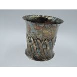 A Victorian silver beaker style vase/container having gadrooned decoration and frilled rim,