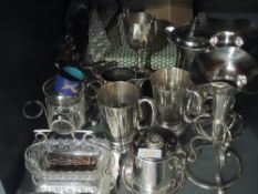 A selection of silver plate including preserve pots, tankards, flatware, bud vases, trophy etc and