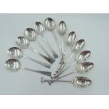 A set of six Art Deco style coffee spoons of plain form, Birmingham 1927, maker WHC, and a set of