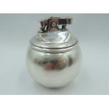 A silver Witch Ball table lighter of plain spherical form by Tiffany & Co England, London 1963, GW