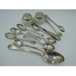A small selection of HM silver including teaspoons, Georgian dessert spoon, silver topped dressing