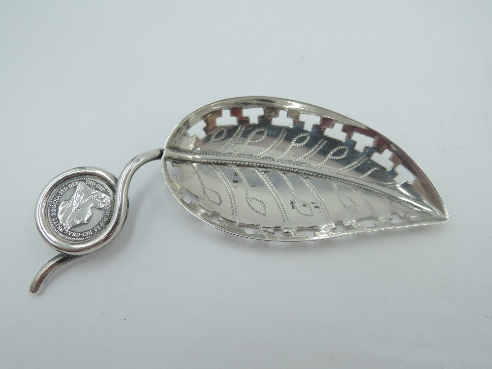An Edwardian silver caddy spoon modelled as a leaf with pierced borders and stalk handle wound round - Image 2 of 4