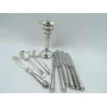 A selection of HM silver and white metal flatware including silver handled butter knives, a