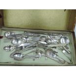 A selection of HM silver flatware including tea and coffee spoons, caddy spoon, butter knives,