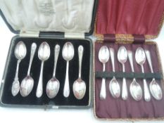 A cased set of six HM silver tea spoons of plain form, a similar cased part set of (5)silver