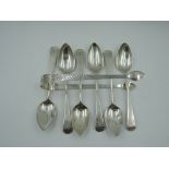 A set of six Georgian silver tea spoons of Old English form bearing monogram to terminals and
