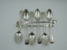 A set of six Georgian silver tea spoons of Old English form bearing monogram to terminals and