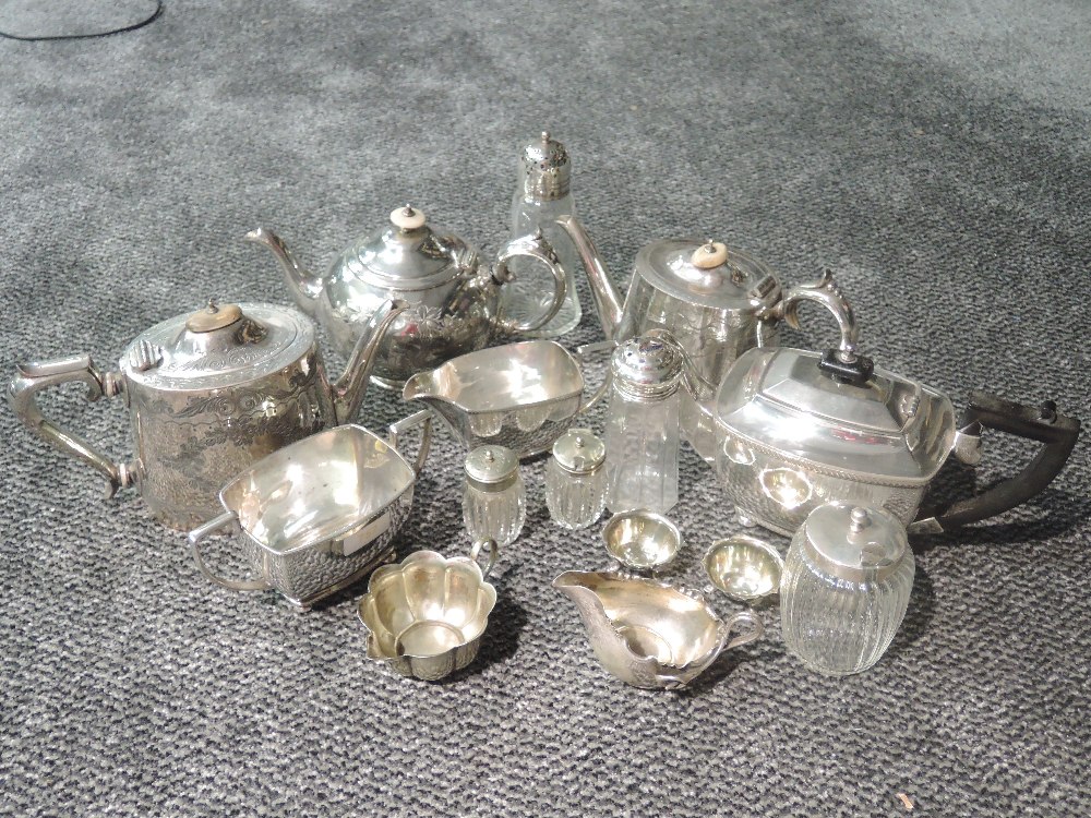 A selection of silver plate including preserve jar, sugar casters including Wembley souvenir,