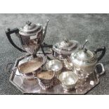 A selection of silver plate including butler's tray, four piece tea and coffee set by