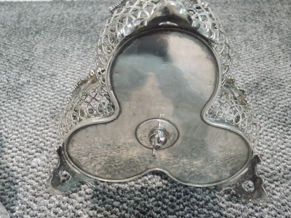 A Victorian silver plated three bottle gallery stand having bacchanalian moulded decoration to rims, - Image 4 of 4