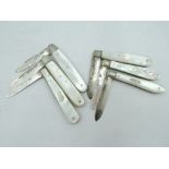 Six small folding fruit knives of small form, all having HM silver blades and mother of pearl