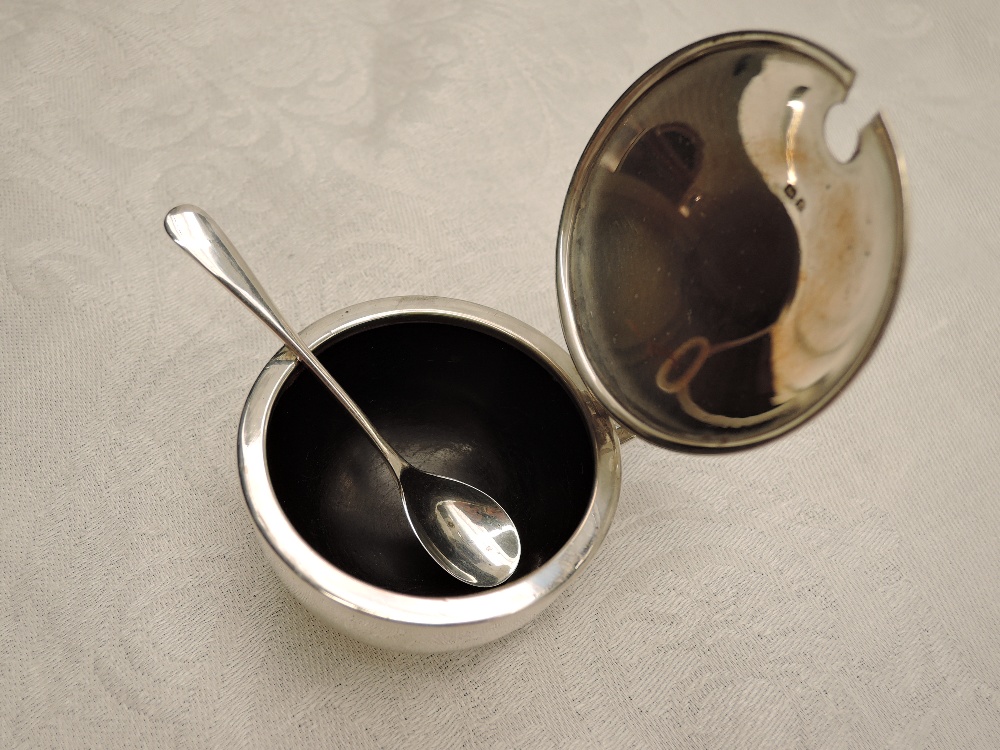 A cased silver five piece cruet set of plain bowl and baluster form, having bakelite liners, - Image 2 of 2
