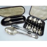 A selection of HM silver including a cased set of six silver teaspoons with a matching pair of sugar