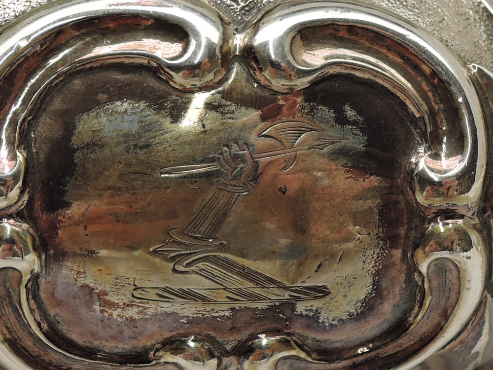 A Victorian Irish silver four piece matched tea set of goad form having extensive repousse and - Image 7 of 10