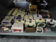 A shelf of modern diecasts including Oxford, Models of Yesteryear, Matchbox, Burago etc, all