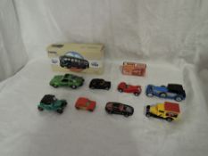 A small collection of diecasts including Matchbox Lesney Superfast Mini in red with 29 racing