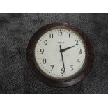 A 20th century Smiths BR (M) 8 Day Railway Station Clock, metal dial set with Arabic numerals,