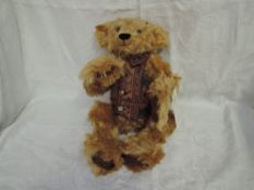 A Shirden Teddies jointed mohair Teddy Bear having growling mechanism, glass eyes, stitched nose and