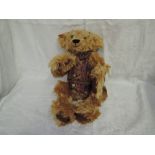 A Shirden Teddies jointed mohair Teddy Bear having growling mechanism, glass eyes, stitched nose and