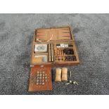 A late 19th century Games Compendium in fitted wooden case containing two sets of James English