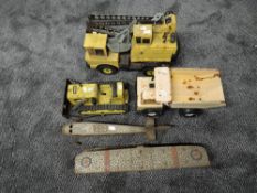 A tin plate Tonka Crane, Ecliud Dumper and Bulldozer along with a English made tin plate and
