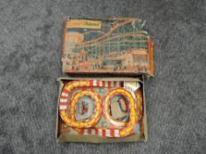 A Technofix tin plate and clockwork Coney Island set 307 with both coaches present in original box