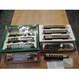 Seven Hornby 00 gauge Pullman and similar Carriages, part boxed along with a Mainline 00 gauge 4-6-0