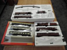 Three Hornby 00 gauge part train sets, Night Mail R1144 having locomotive, two carriages, track