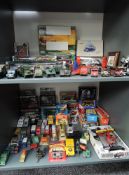 Two shelves of mixed vintage diecasts, mainly Land Rover related including Burago, Corgi,