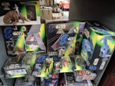 A collection of Kenner Star Wars accessories all in green boxes and bubble cards, T-16 SkyHopper,