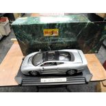 A Maisto 1:12 scale diecast model, Jaguar XJ220, boxed